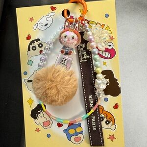 Authentic Hermes Ribbon Keychain Phone with Doll